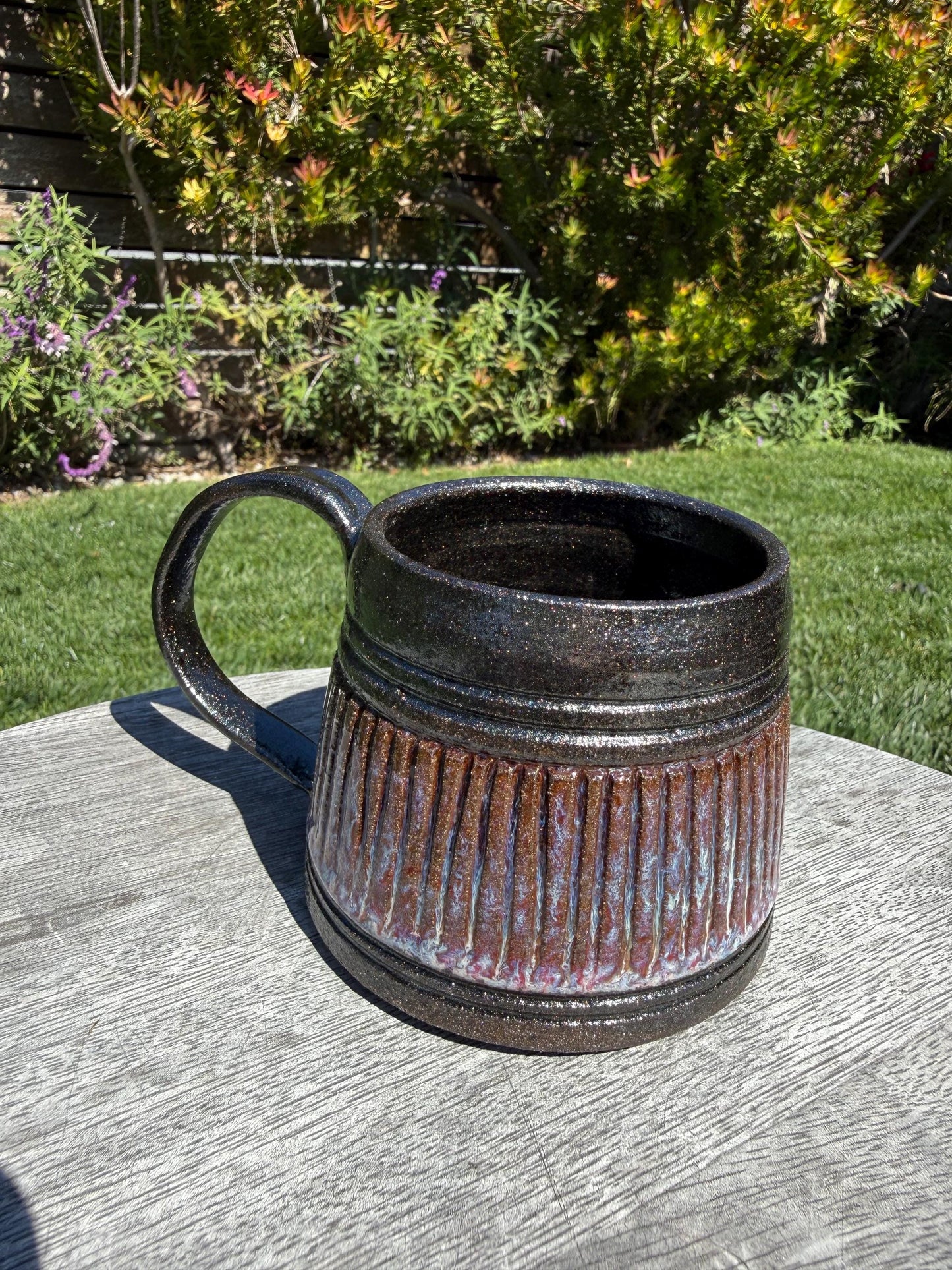 Handmade carved stoneware mug, A-shape coffee cup with stable base and comfortable handle, made with black clay and sparkly black glaze - Ceramics By Court