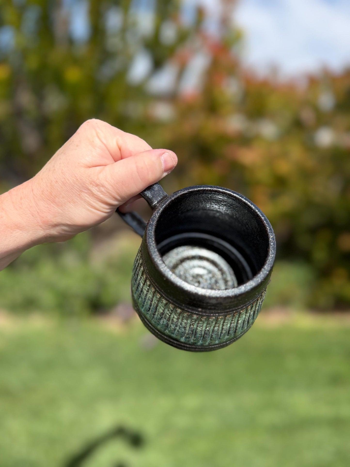 Handmade carved stoneware mug, A-shape coffee cup with stable base and comfortable handle, made with black clay and sparkly black glaze - Ceramics By Court