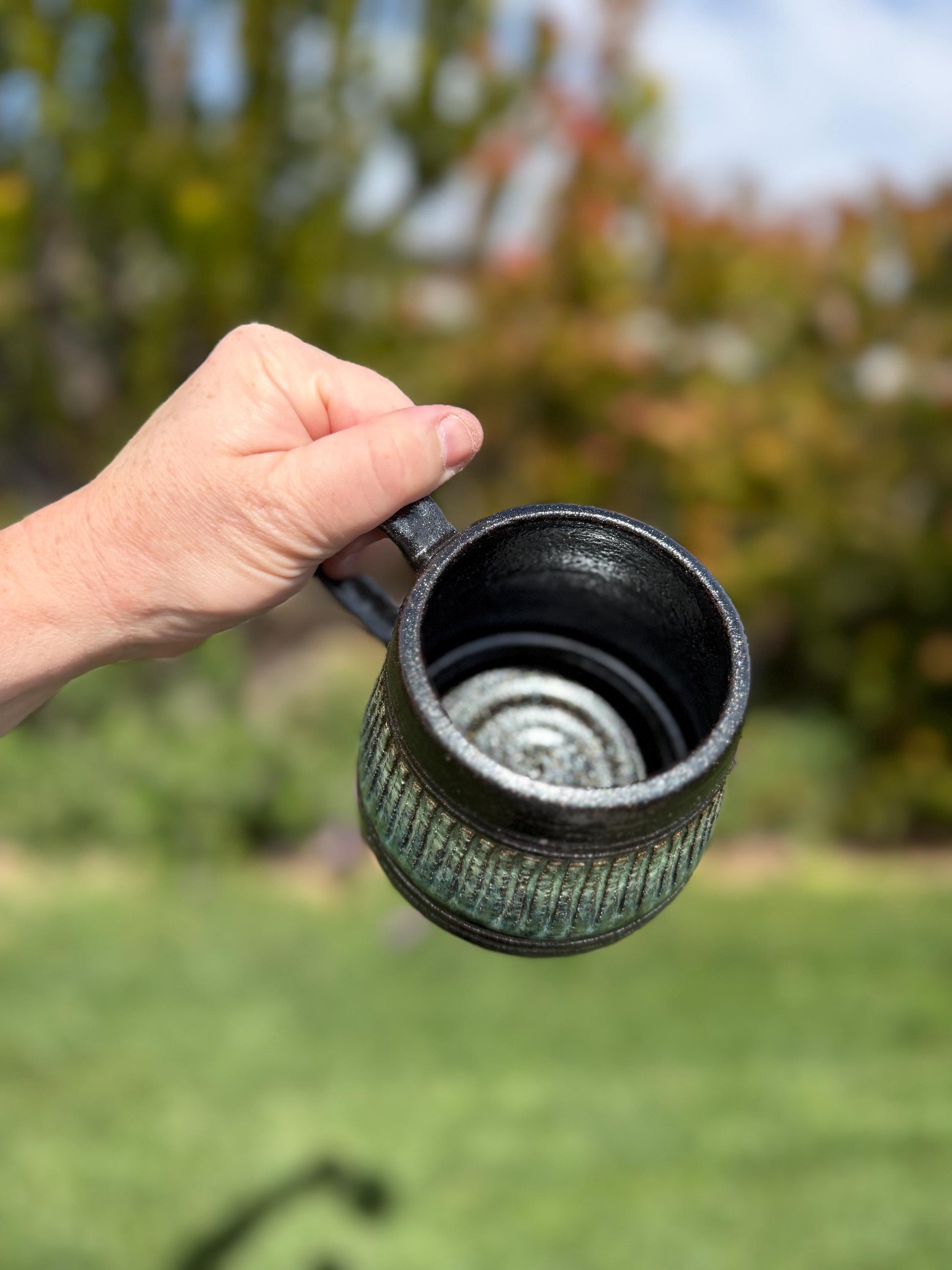 Handmade carved stoneware mug, A-shape coffee cup with stable base and comfortable handle, made with black clay and sparkly black glaze - Ceramics By Court